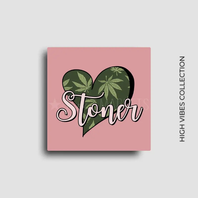 Cannabis themed novelty fridge magnet featuring a heart-shaped design with cannabis leaves and 'Stoner' text on a muave pink  background. Custom design by ink and magnets available for wholesale orders.