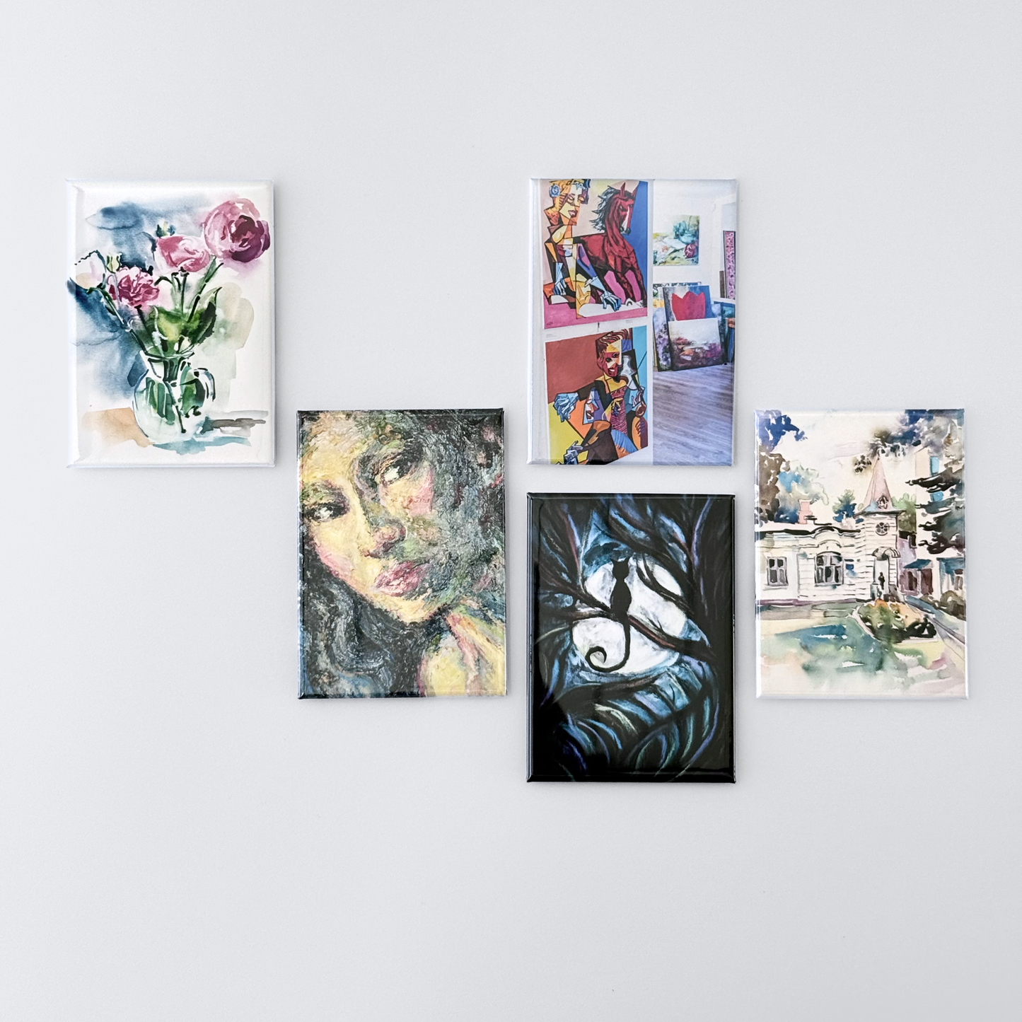 Collection of button magnets made from artwork, illustrations, photography, and giclee prints. Available for wholesale or gifting, no minimum order spend.