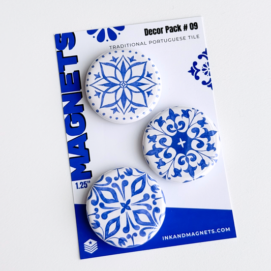 Decorative magnets with blue and white patterns featuring Portuguese tile designs.