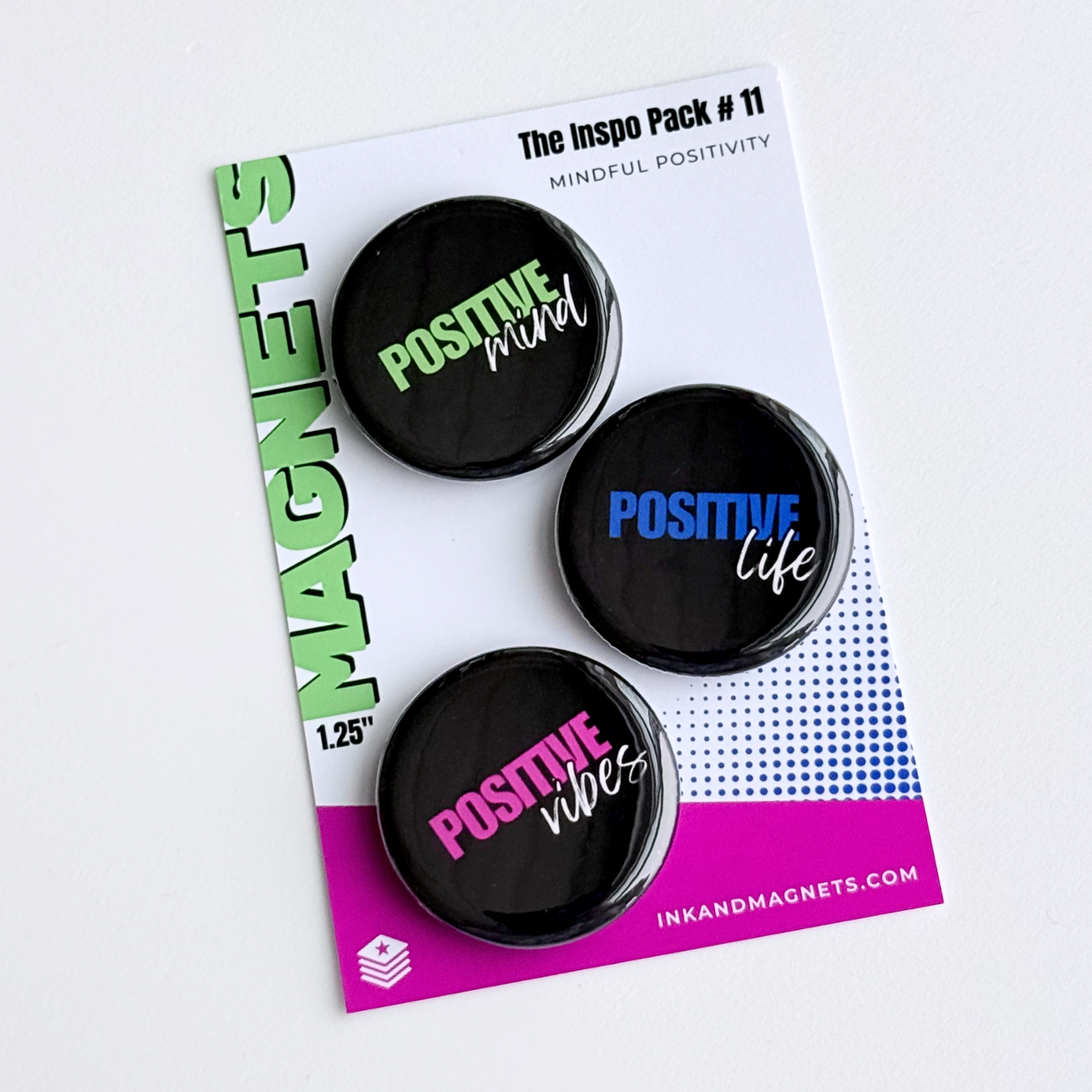 Set of three black magnets with 'Positive Mind', 'Positive Life', and 'Positive Vibes'  bright text. Daily reminders to lead your day with mindfulness. Ink and Magnets Pack number 11 is great for the fridge, office, or garage workbench for a small daily pick me up.