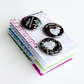 Round button magnets featuring matching succulent designs with motivational messages on a black background.