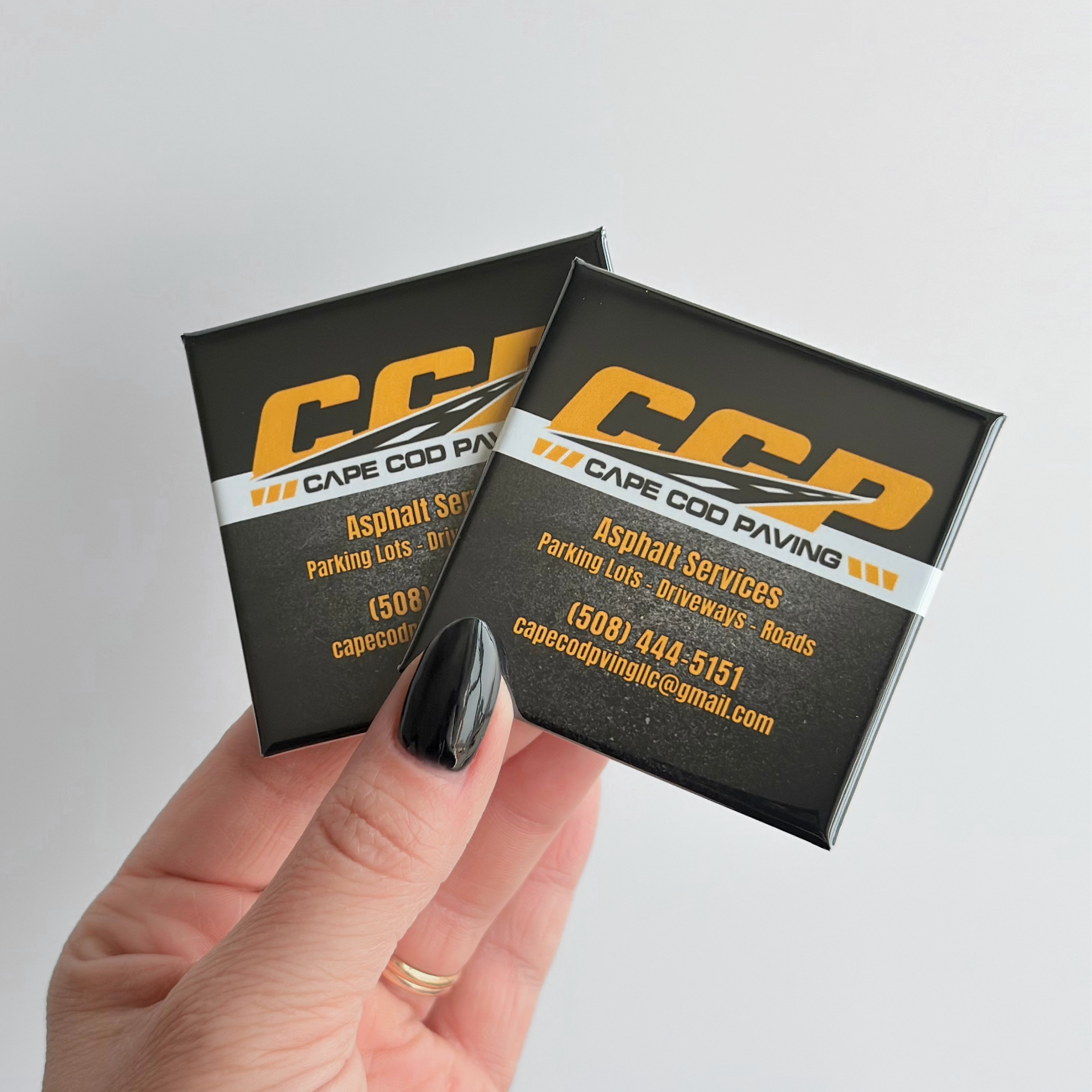 Custom button magnets for business and promotional use with customer submitted logo and business info, designed by ink and magnets. 
