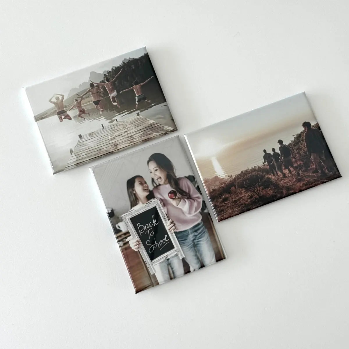 Custom photo magnets with back to school and summer memory photos, styled as a meaningful gift idea for teachers and a sentimental magnetic display for home or classroom.