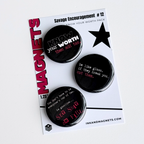 Set of three black button style fridge magnets with motivational phrases on an ink and magnets branded retail card. 