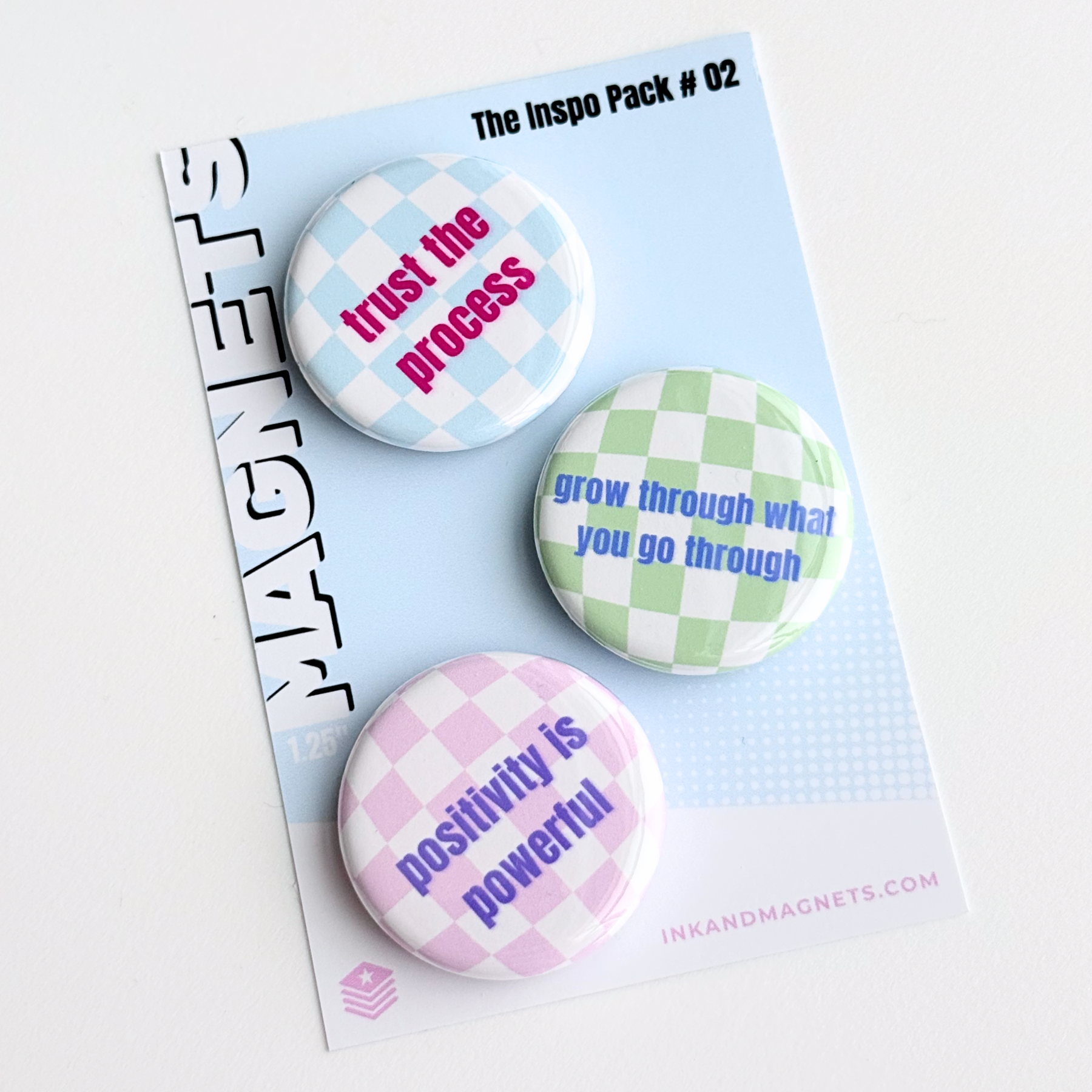 Button Magnet Set with pastel checkered design and motivational messages. This inspo pack is perfectly giftable and pairs well with inspo pack number 1. Small but mighty magnets proudly made in the USA by Ink and Magnets.