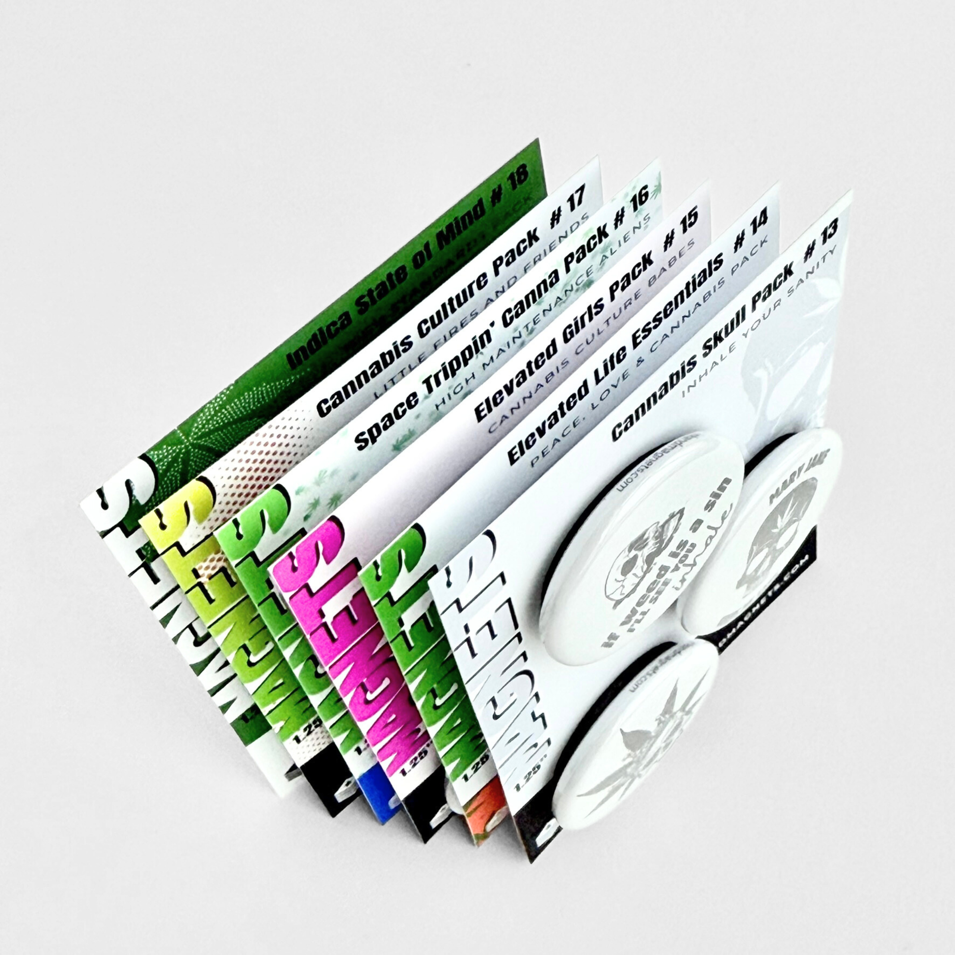 Collection of cannabis culture novelty magnet packs featuring humorous weed-themed designs displayed on retail card. Packs 13-18 available as pinbacks and button magnets.