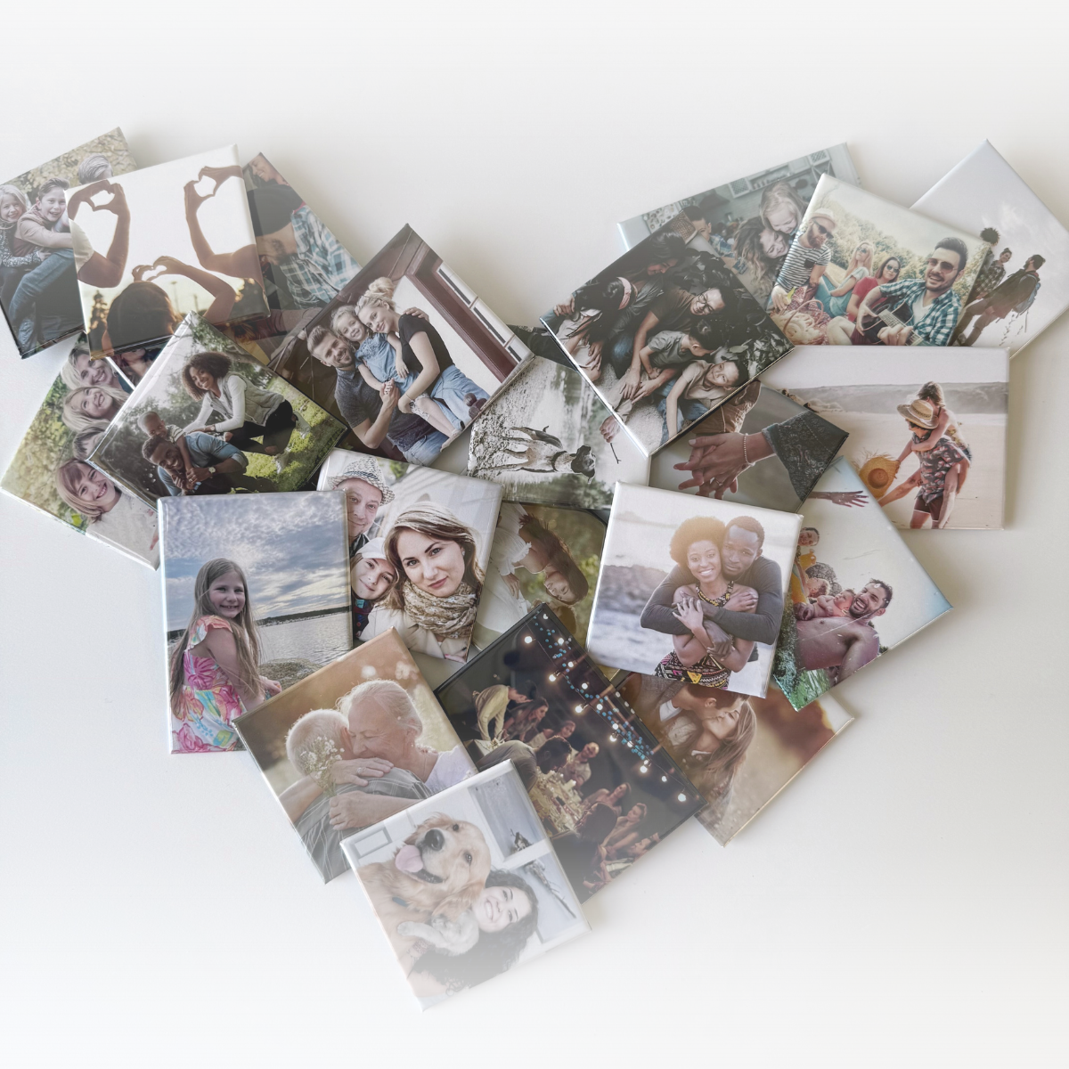 Custom photo magnets arranged in a heart shape. Personalized photo gifts showcasing family memories. For every face, moment and adventure worth remembering a little longer.