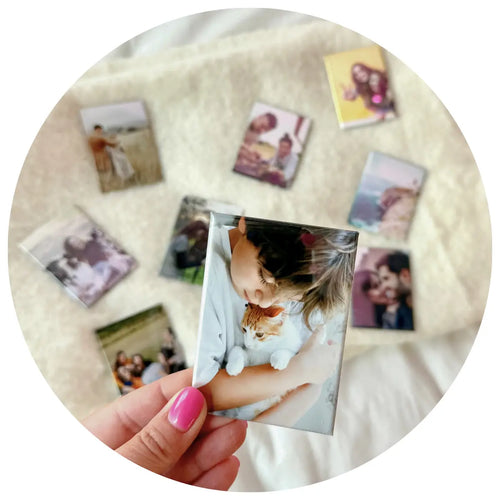 Custom photo magnets of a cozy display of affection between a child and their pet. A picture was taken and turned into a fridge magnet. 