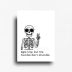Fridge magnet that reads, " Egos trip, but the humble don't stumble," with a skeleton holding up a peace sign and sunglasses. 