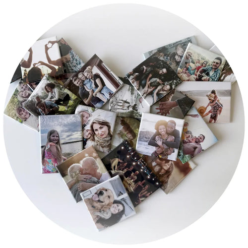 Assorted custom photo magnets featuring family, pets, travel, and everyday memories, shown in a heartfelt pile as sentimental magnetic keepsakes.