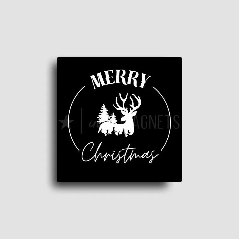 Simple black fridge magnet with a 'merry christmas' message and a deer with trees. Kitchen decor or small gift for christmas. 