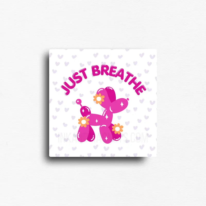 Mindfulness quote fridge magnet featuring the message "Just Breathe" with whimsical balloon dog artwork, pastel hearts, and cheerful floral accents. Uplifting décor for refrigerators, lockers, office file cabinets, and magnetic boards.