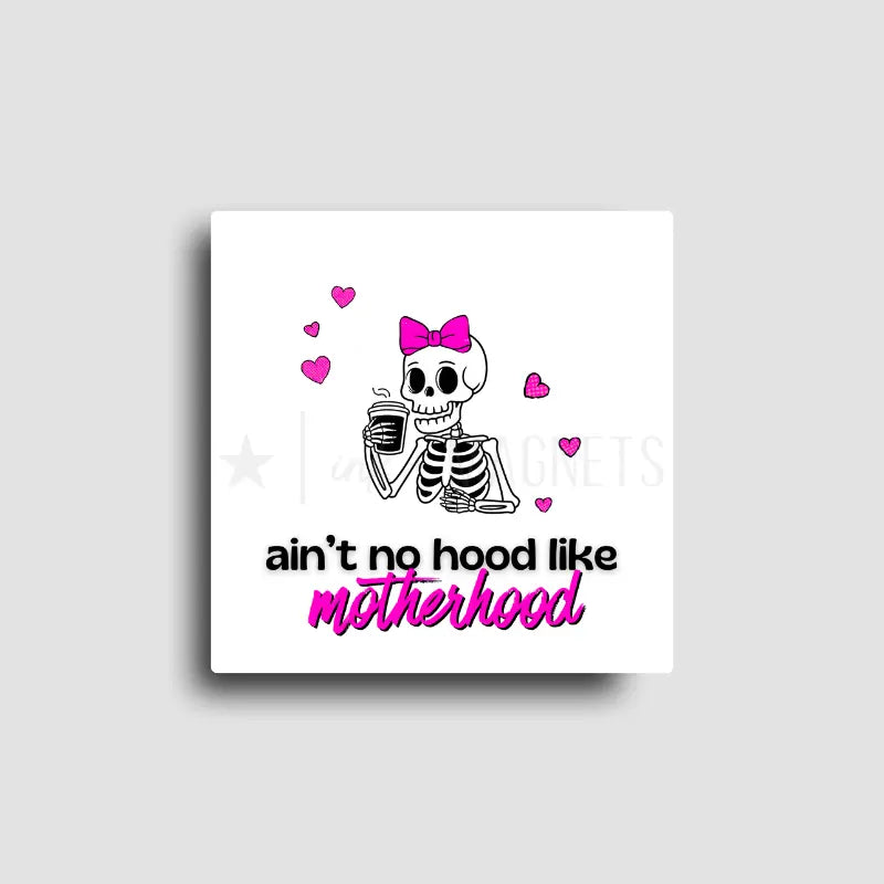 Novelty fridge magnet reads, "Aint no hood like Motherhood," showcasing a skeleton with a pink bow and hearts, holding a coffee. Savage truths about motherhood, meant to make you laugh.