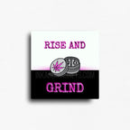 Rise and grind magnet with pink text and cannabis grinder illustration on white and black background, square novelty fridge magnet