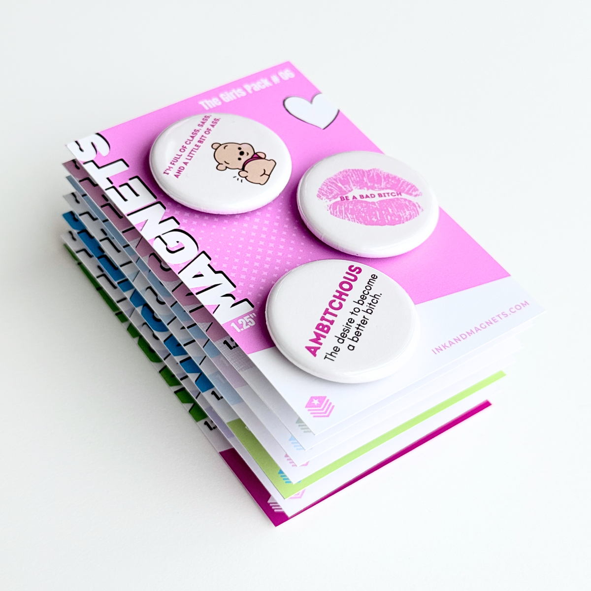3 piece button magnets sets stacked neatly. Featuring a fierce girly design pack.