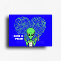 Funny cannabis novelty fridge magnet with green alien with 'I Come in Peace!' text against a blue background with a heart shaped weed leaf pattern. Designed by Ink and Magnets. 
